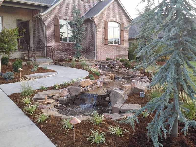 After Landscaping & Water Feature
