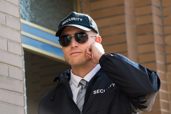 Security Guard Standing In Front Of The Entrance — San Pedro, CA — Delta Bravo Group