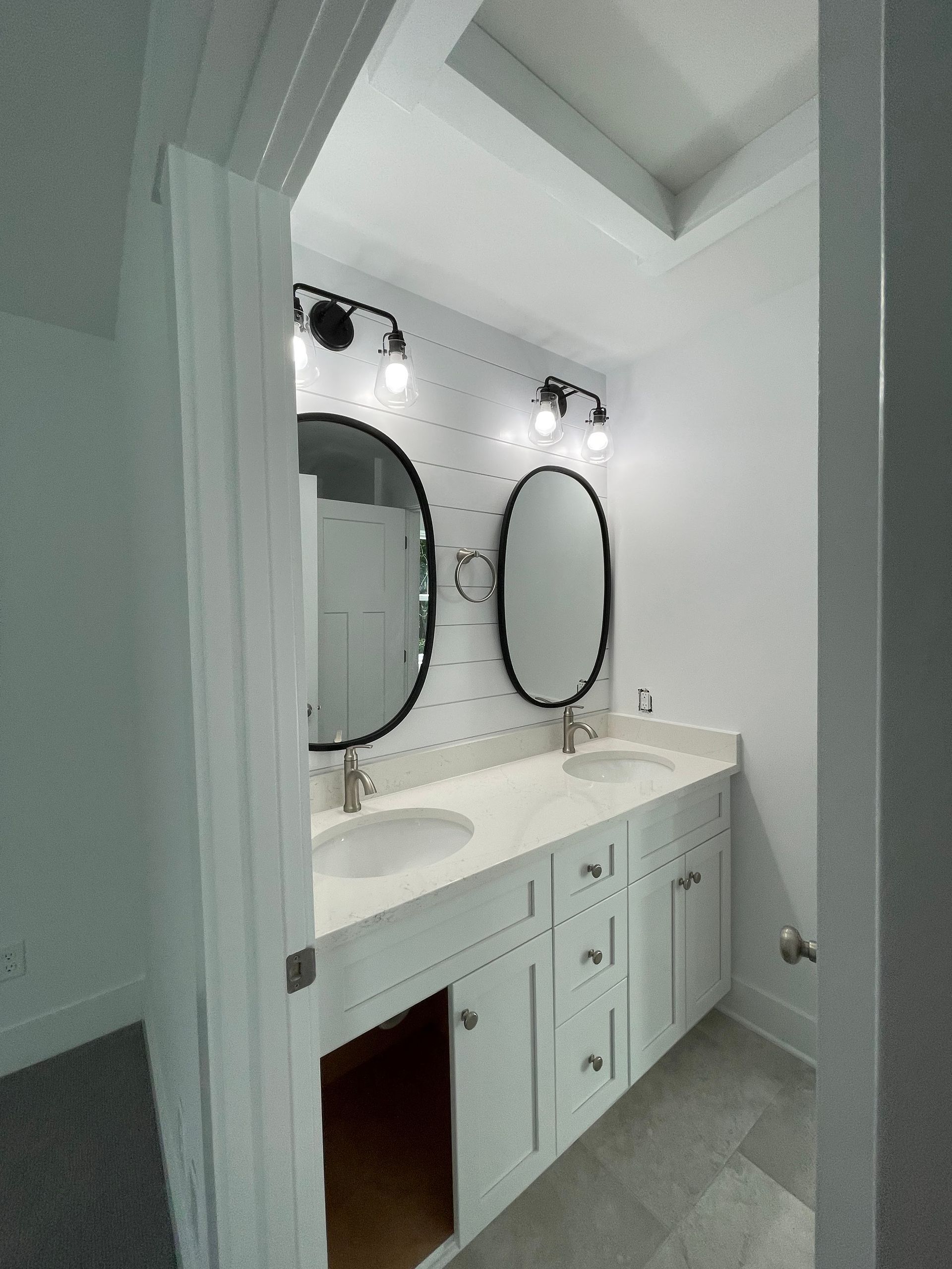 Rounded Mirrors On The Bathroom — Wilmington, NC — Villa’s NC Painting