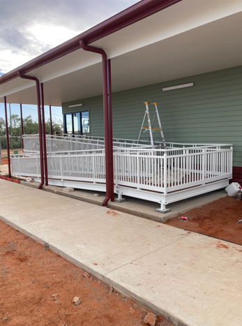 A ramp is being built on the side of a building.