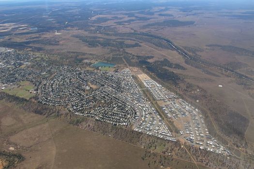 An Aerial View Of A City In The Middle Of A Desert — Custom Steel Fab in Moranbah, QLD