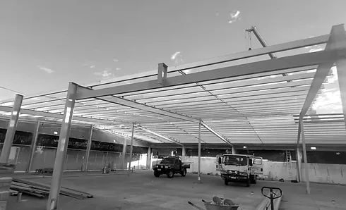 Building Under Construction with A Truck Parked Underneath It — Complete Fabrication in Townsville