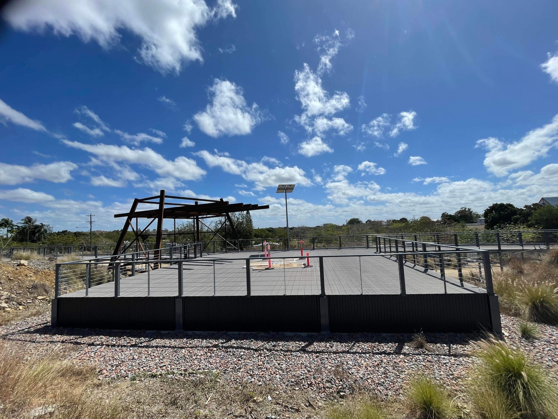 A Playground Is Being Built In The Middle Of A Desert On A Sunny Day — Custom Steel Fab in Garbutt, QLD