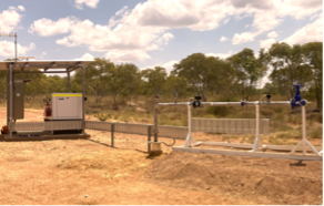 A Fence In The Middle Of A Field With Trees In The Background — Custom Steel Fab in Garbutt, QLD