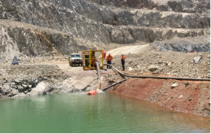 A Group Of People Are Standing Next To A Body Of Water — Custom Steel Fab in Garbutt, QLD