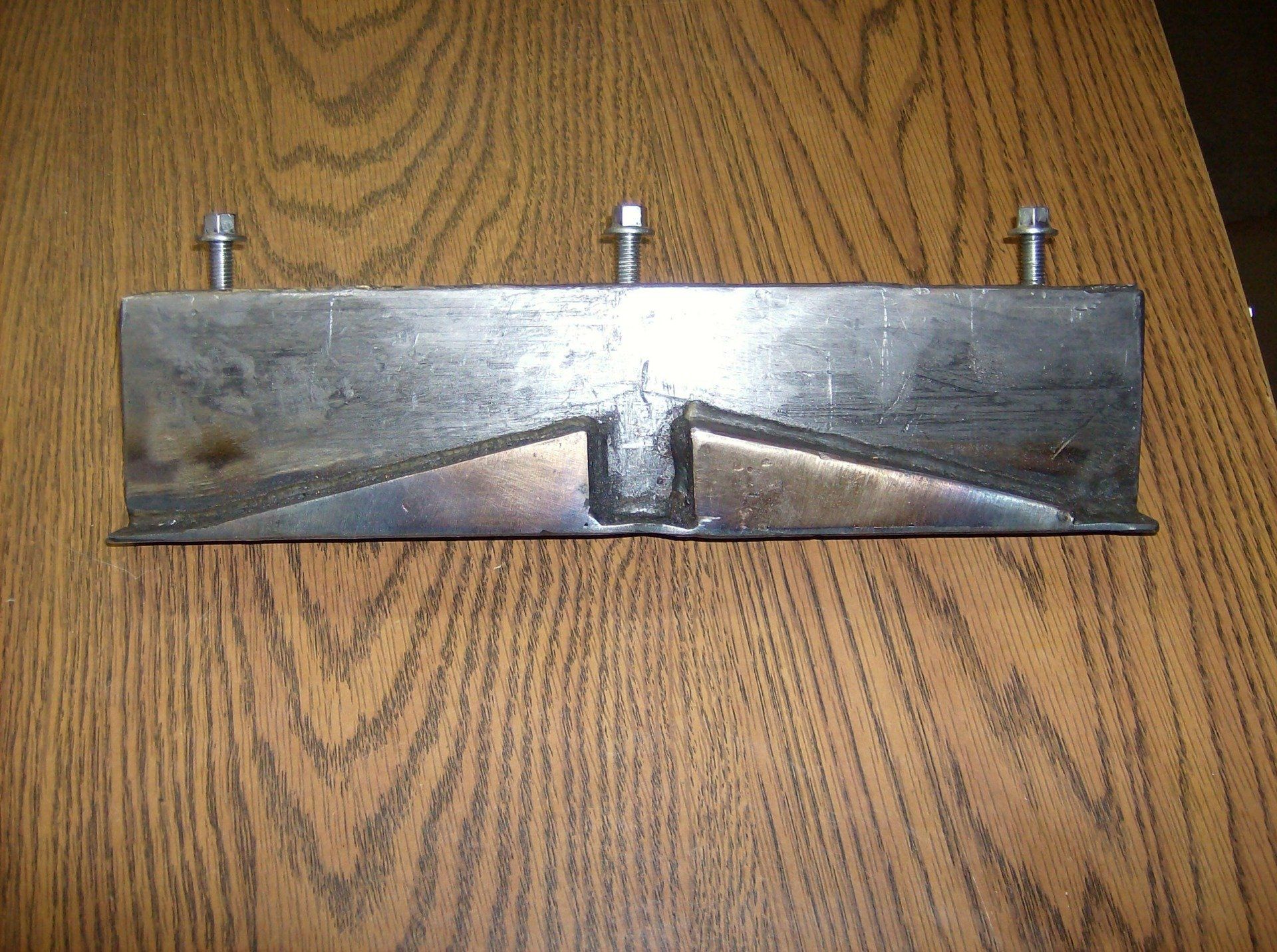 Image Of A Metal Part Of Machine — Olivia, NC — Olivia Machine & Tool, Inc