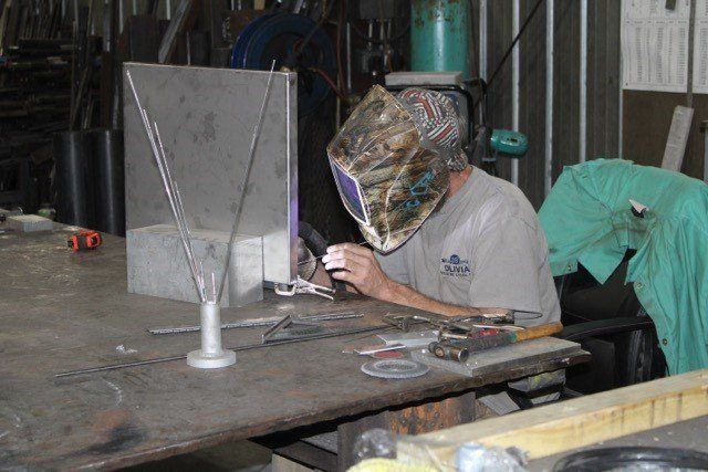 Man Welding The Metal — Olivia, NC — Olivia Machine & Tool, Inc