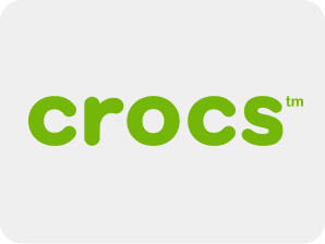 Crocs logo in green on a light gray background.