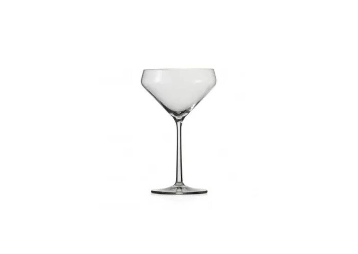 A clear, V-shaped cocktail coupe glass with a long, slender stem standing on a circular base against a white background.