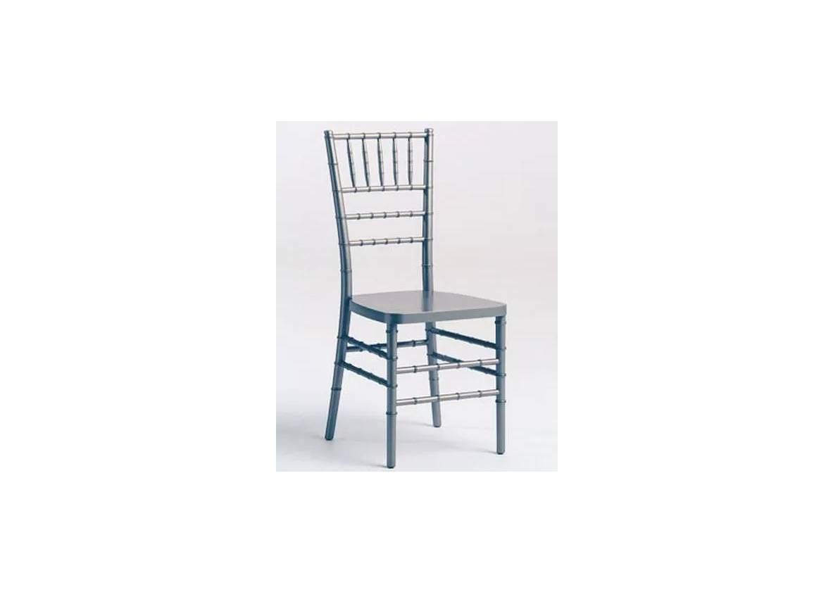 A silver Chiavari chair with a spindled back and flat seat on a plain white background.