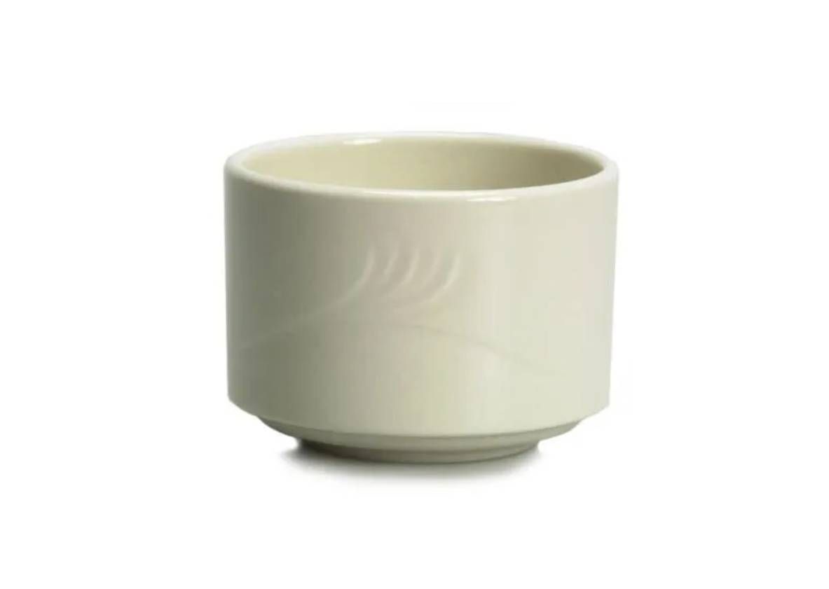 A simple, off-white ceramic teacup with a subtle, embossed feather-like pattern on its side, isolated against a white back.