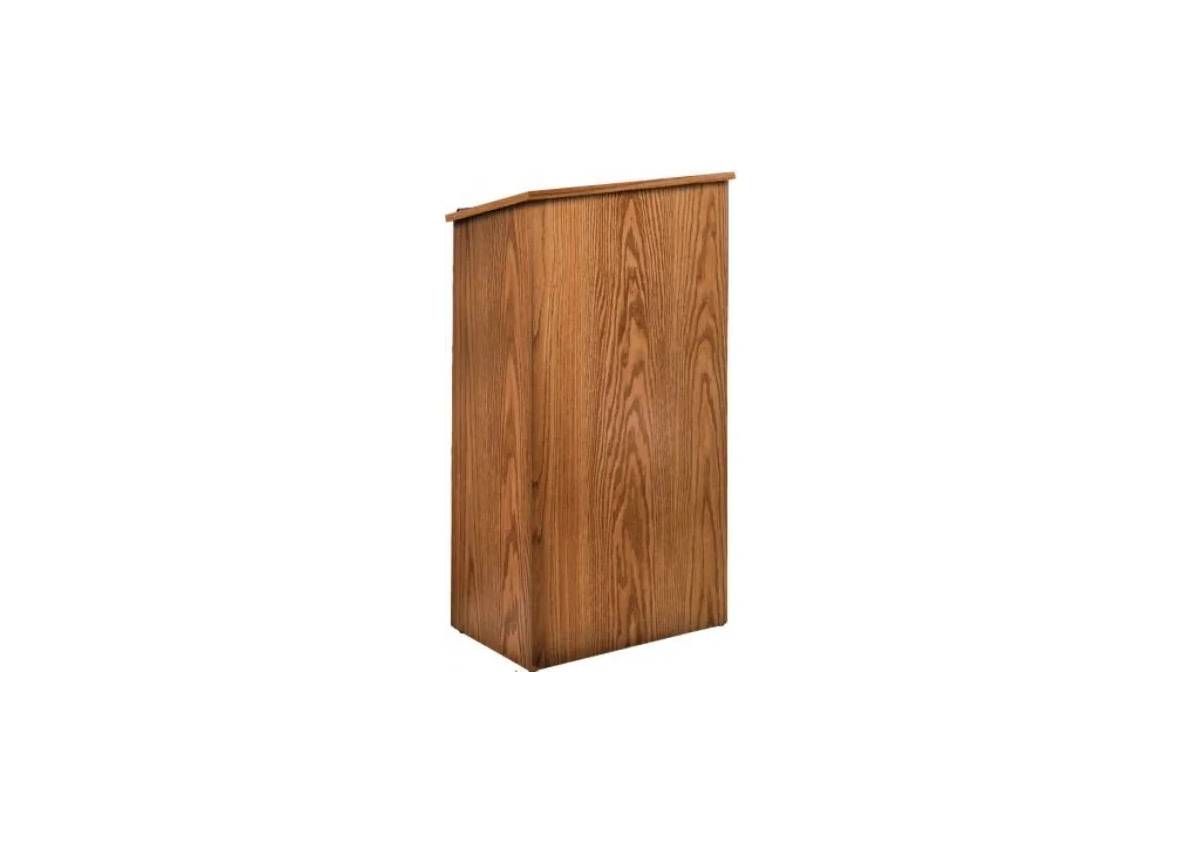 A tall, light brown wooden lectern or podium with a slanted top, isolated against a white background.