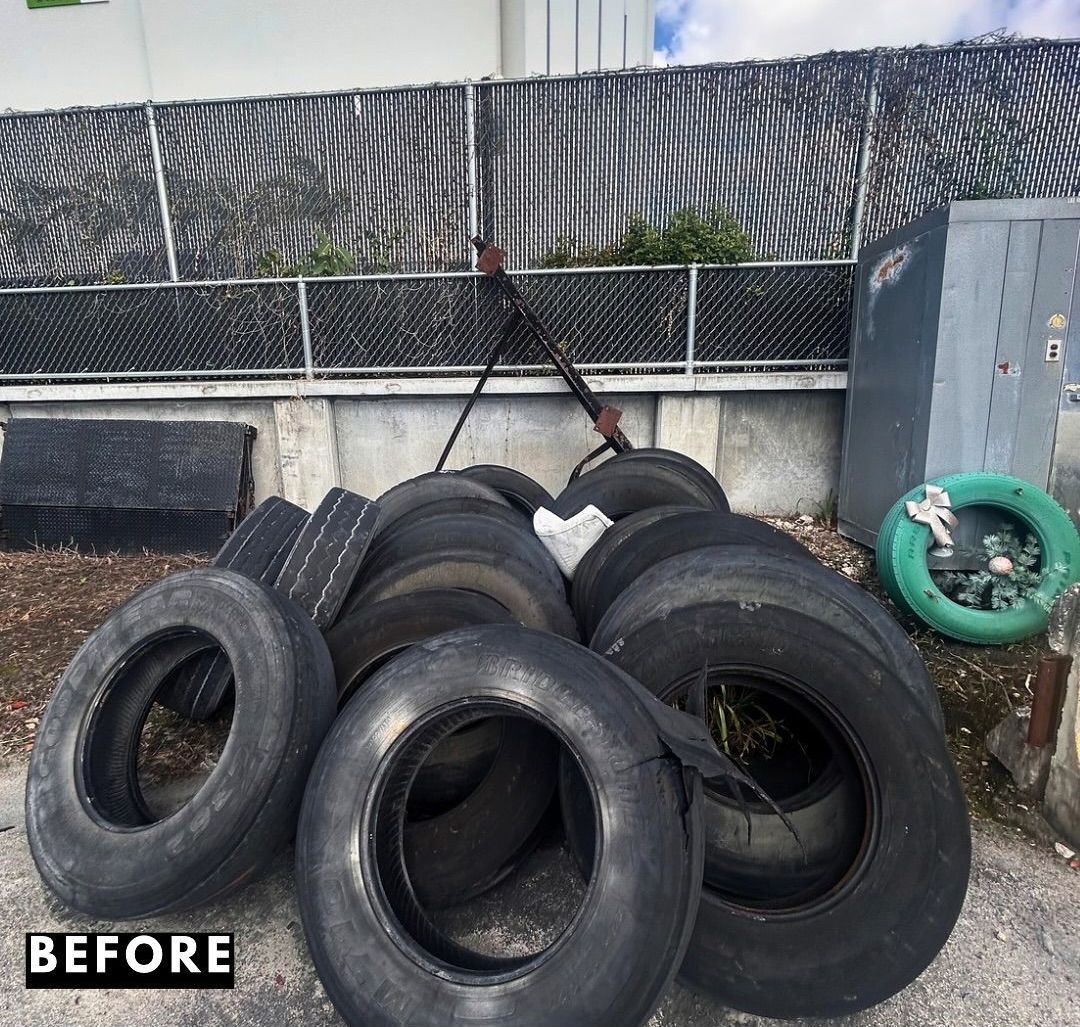 A bunch of tires are stacked on top of each other