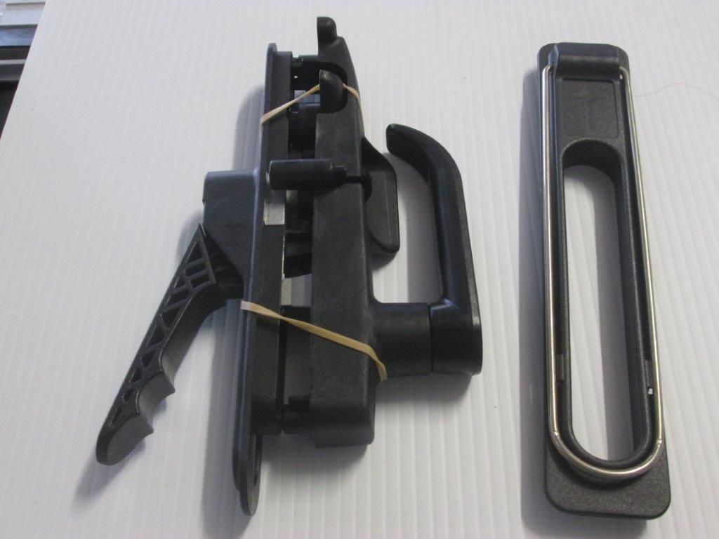 Black Sliding Door Handle And Frame On A White Surface — Caravan Experts In The Charters Towers Region, QLD