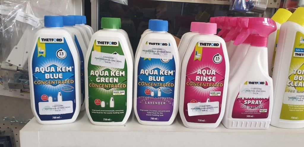 Bottles Of Cleaning Products, Including Aqua Kem And Spray Bottles — Caravan Experts In The Charters Towers Region, QLD