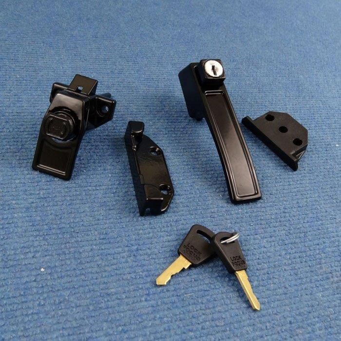 Black Door Lock Set With Keys On Blue Fabric — Caravan Experts In The Charters Towers Region, QLD