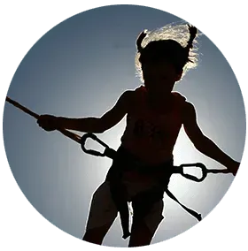 Young girl having fun in bungee trampoline