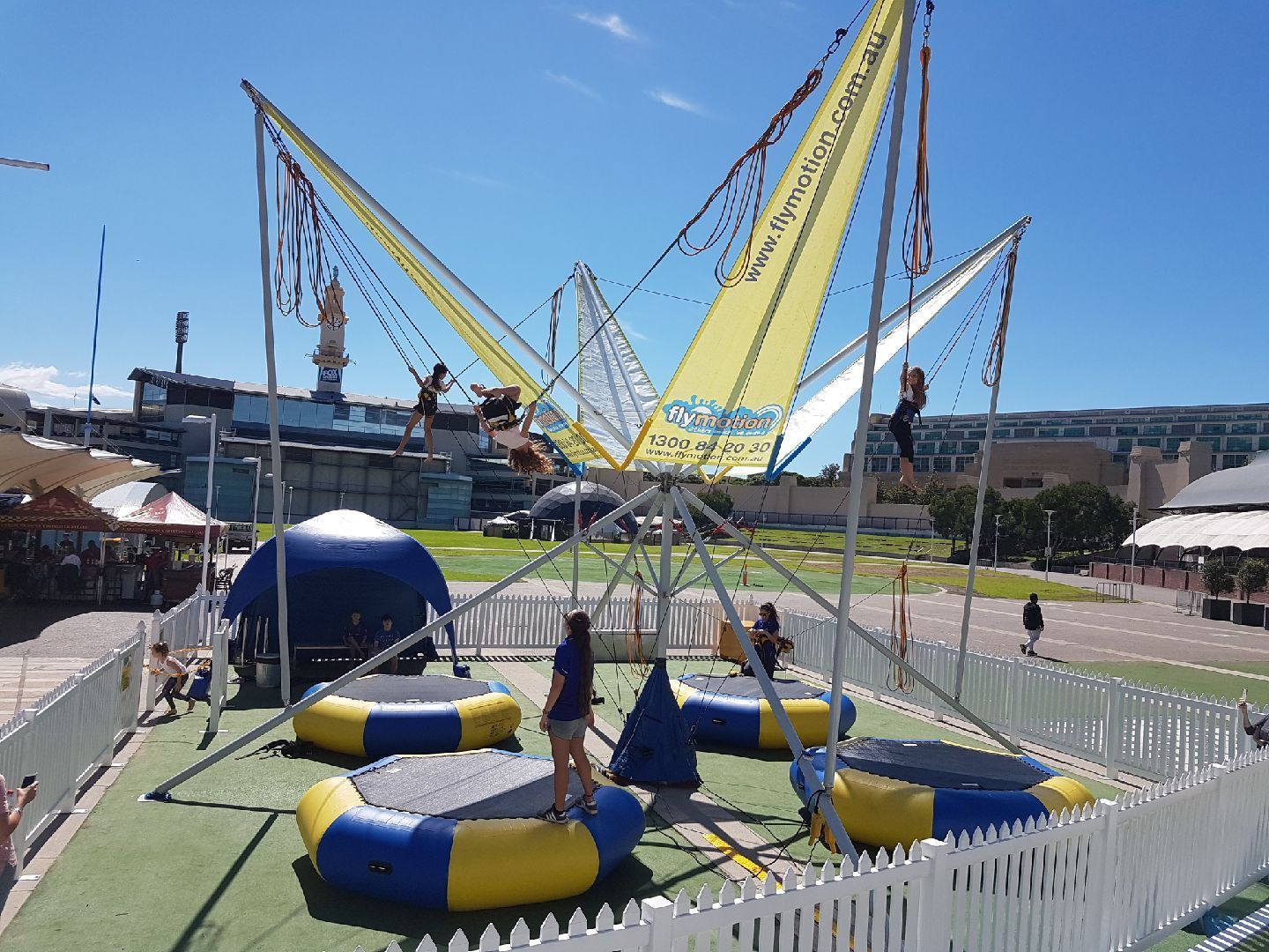 Young kid enjoying in bungy trampoline 