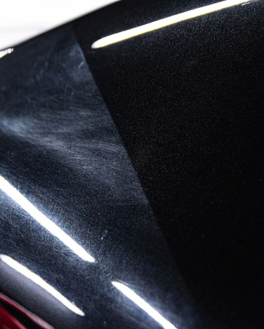 A close up of a car wheel with a mercedes logo on it