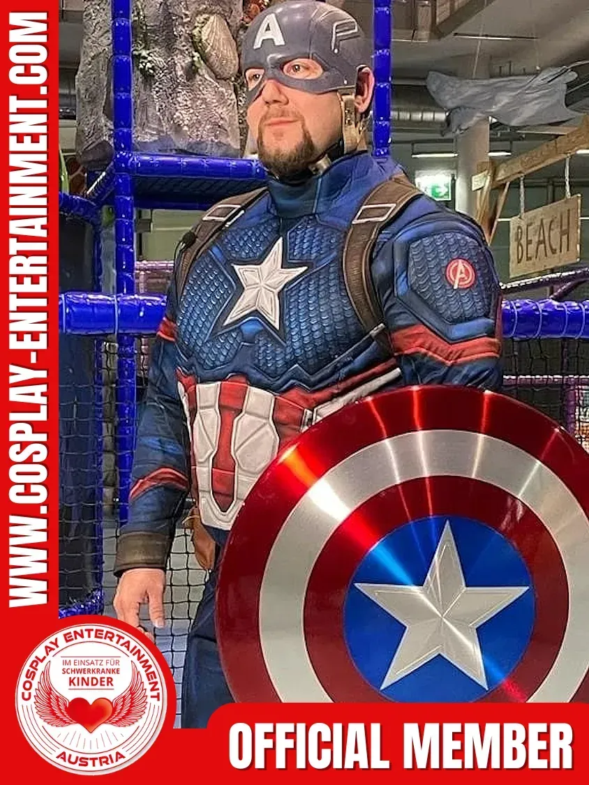 Ein Mann im Captain-America-Kostüm hält einen Schild ist offizielles Mitglied.