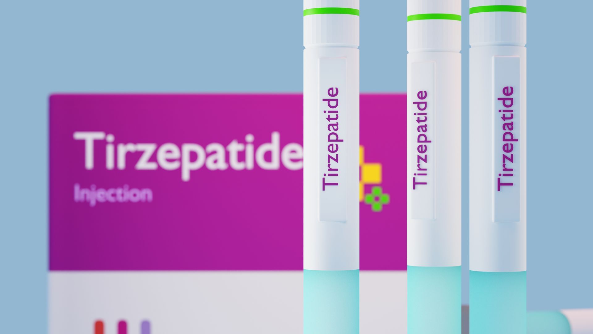 Three tubes of tirzepatide injection are sitting next to a box.