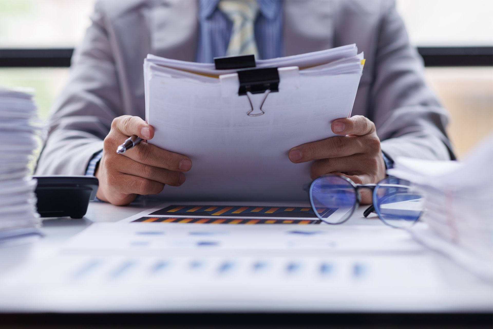 Man Holding Documents