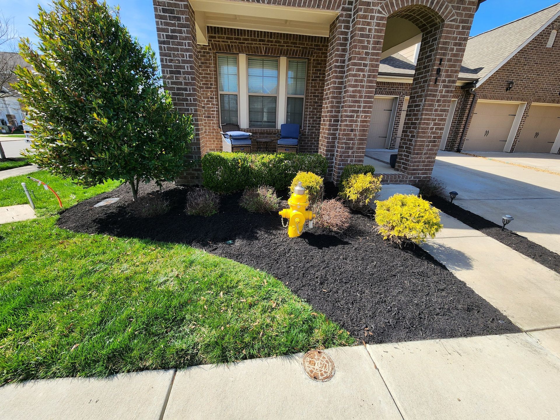 Mulch Install in residential landscape bed in front yard