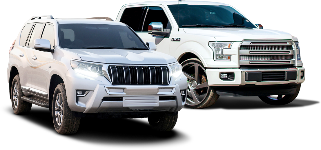 Two white vehicles | Roe Jan Auto Center LLC
