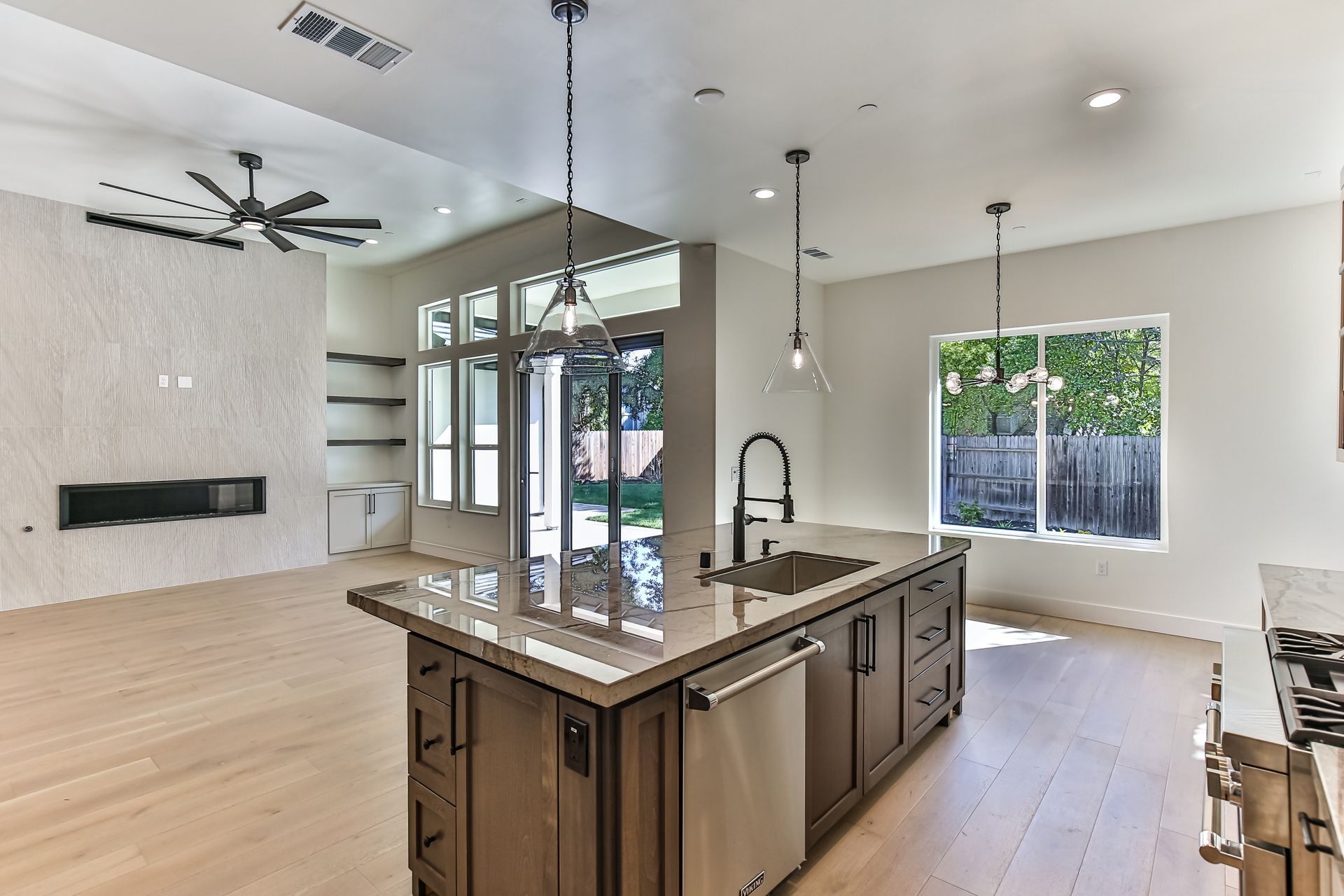 There is a large island in the middle of the kitchen.