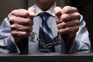 Man wearing handcuffs - bail bonds in Columbia, TN