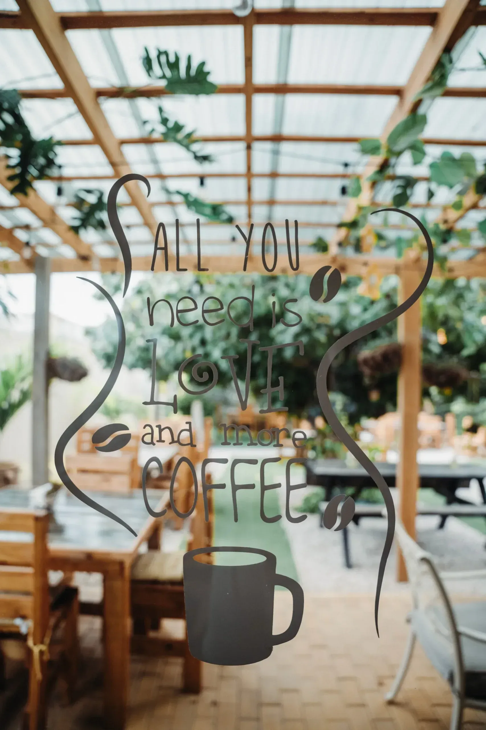 A sign that says all you need is love and coffee