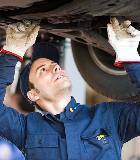 Mechanic Checking Car Condition - Automotive Repair in Hillsborough, NC