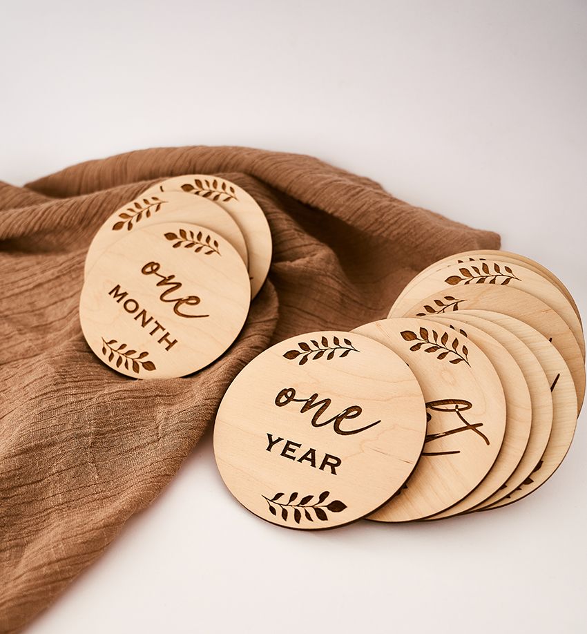 A Bunch of Wooden Circles That Say One Month and One Year — Ace Wholesale Trophies & Engraving In Proserpine, QLD