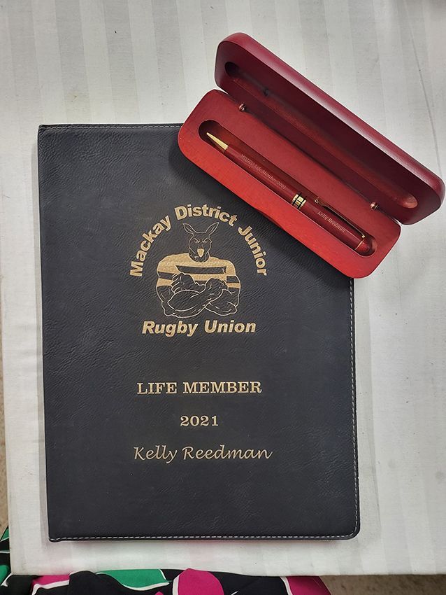 A Rugby Union Pen ion Top of a Black Book — Ace Wholesale Trophies & Engraving In Bakers Creek, QLD