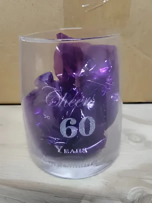 A Glass with the Words 'Cheers 60' Engraved — Ace Wholesale Trophies & Engraving In Moranbah, QLD