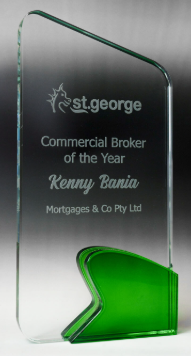 Three Trophies Are Stacked On Top Of Each Other On A Table — Ace Wholesale Trophies & Engraving In Bakers Creek, QLD