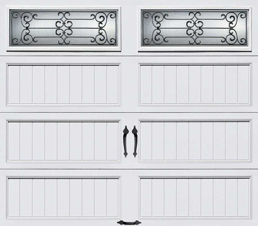 a white garage door with a wrought iron design on it