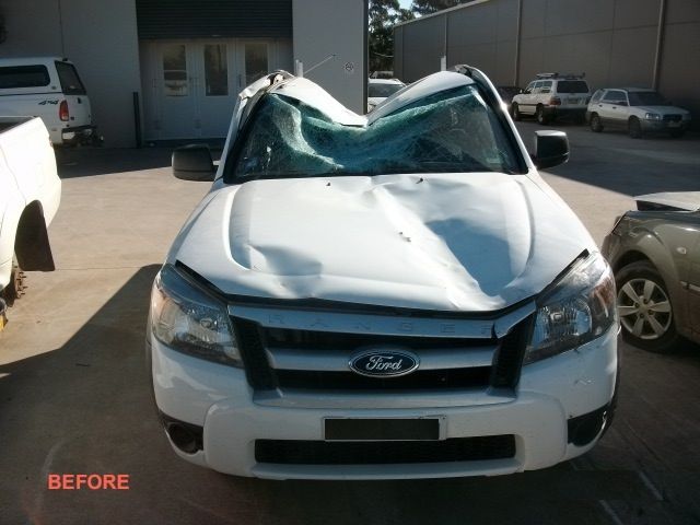 A before picture of a white ford truck