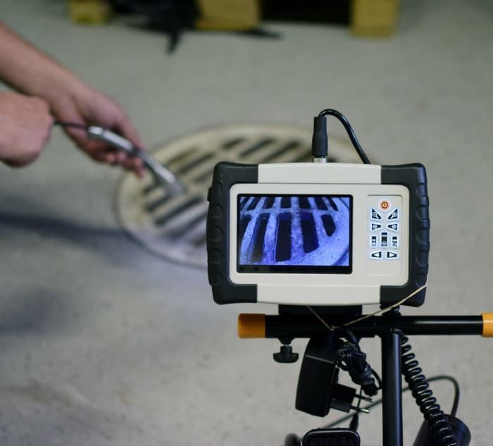 camera searching inside of a sewer