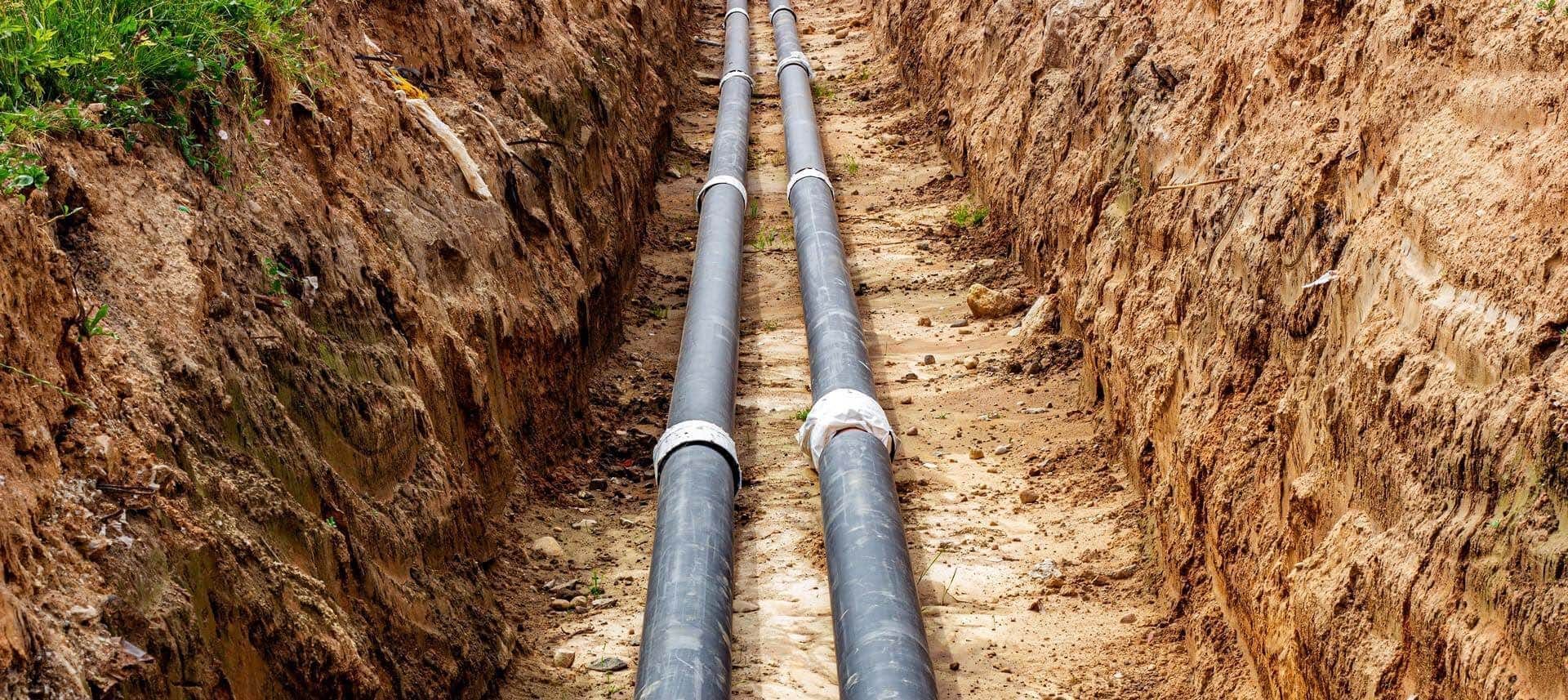 A pair of plumbing tubes for sewers