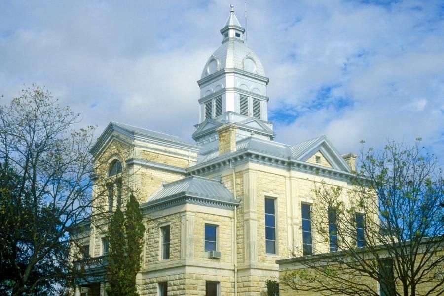A large building with a clock tower on top of it.