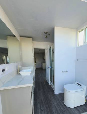 Custom Shipping Container Interior with custom toilet and shower