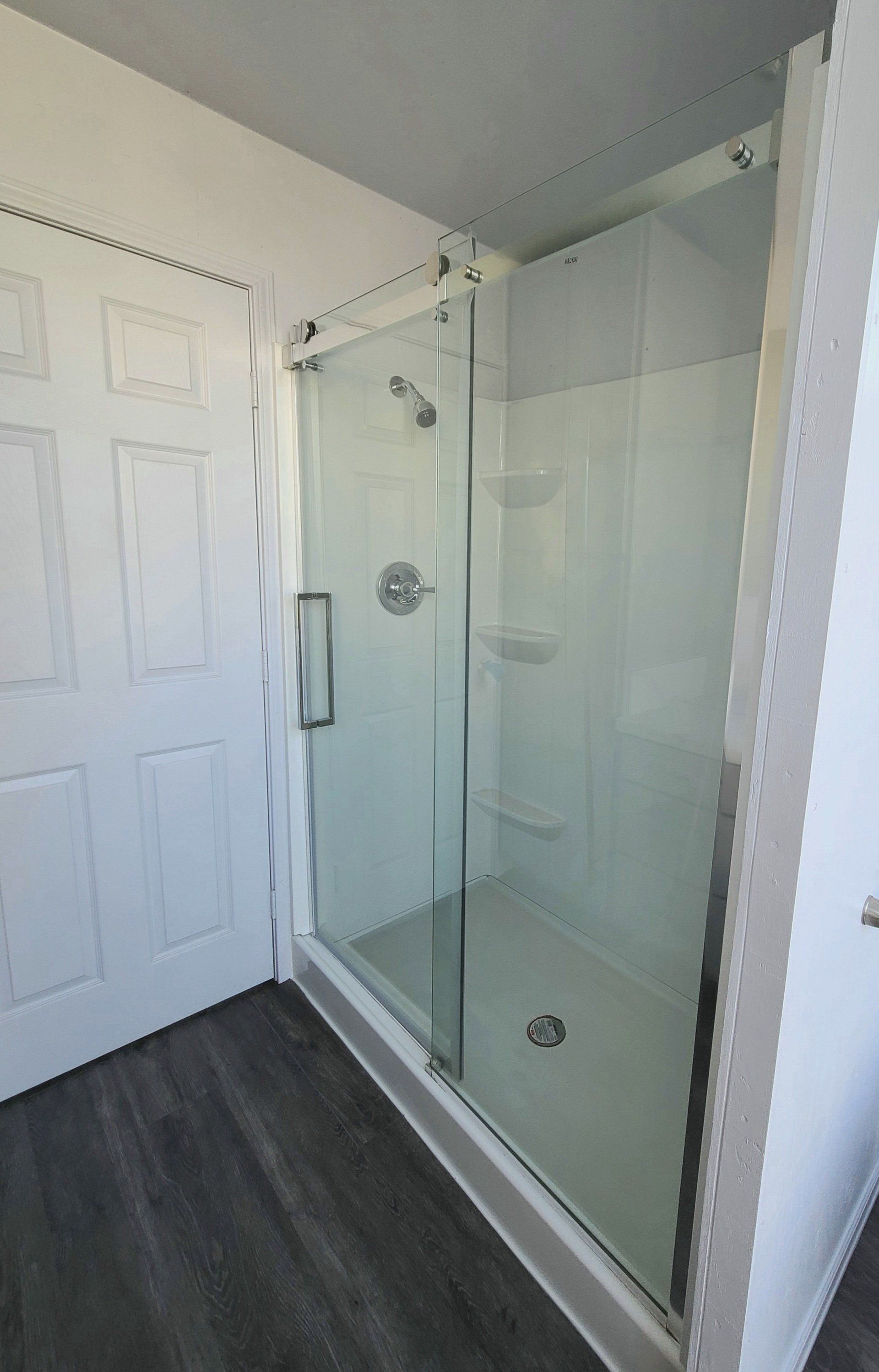 Custom Shipping Container Interior with custom glass enclosed shower