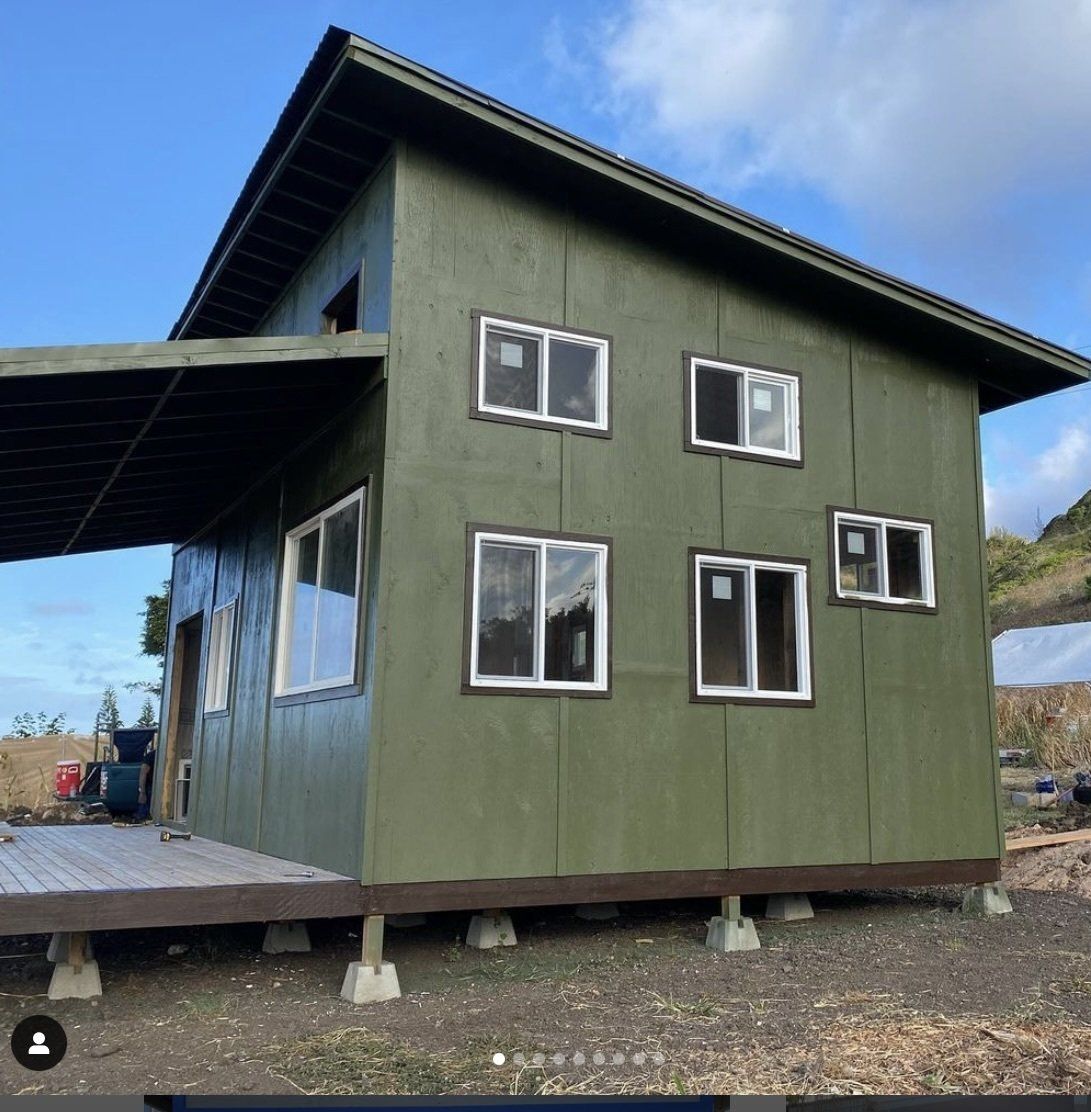 Studio shed with custom exterior, roof and decking