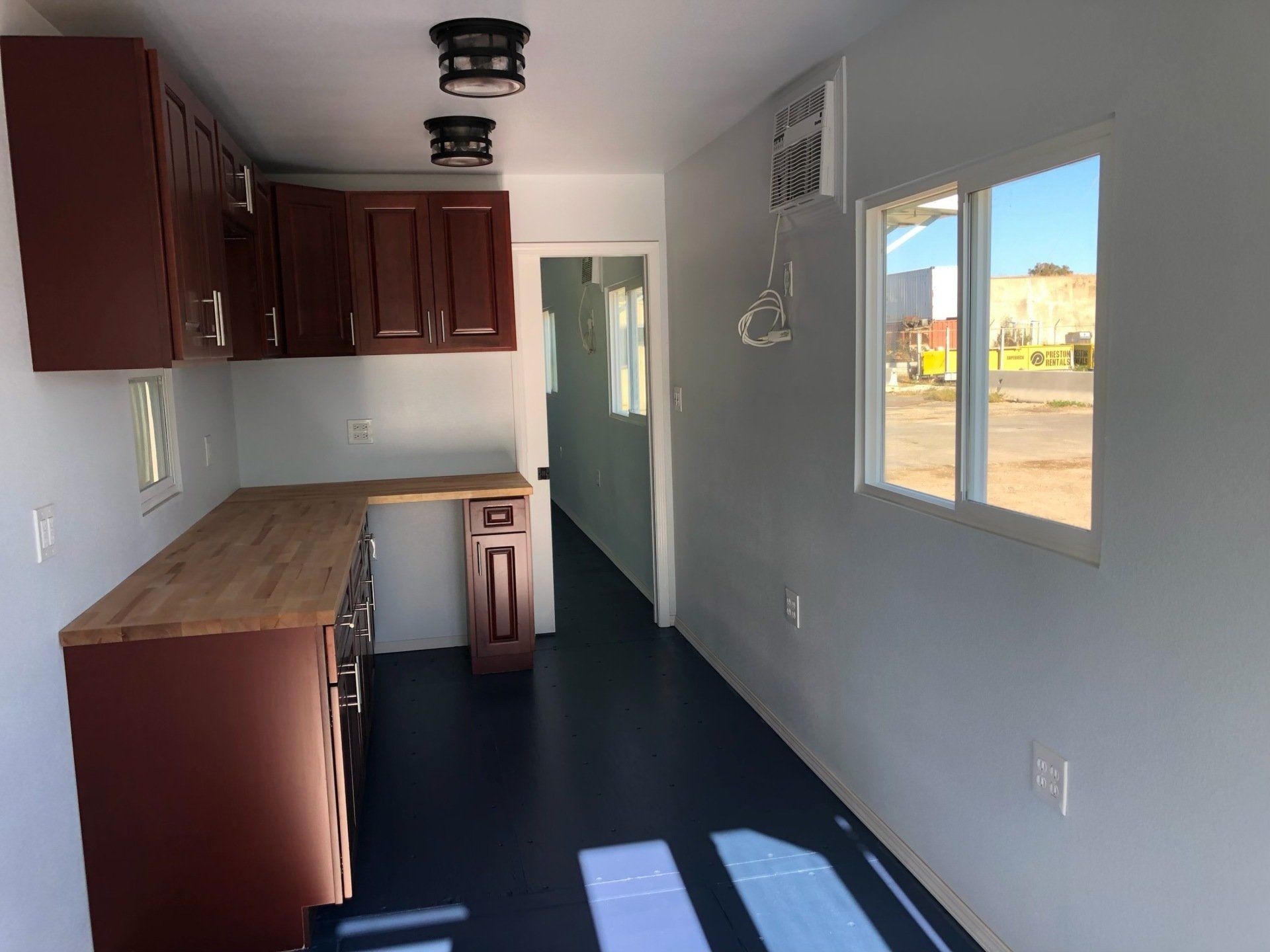 Custom Shipping Container Interior with kitchen and cabinets