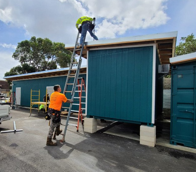 City and County of Honolulu Kapahulu Coning Yard showing workers installing custom roof