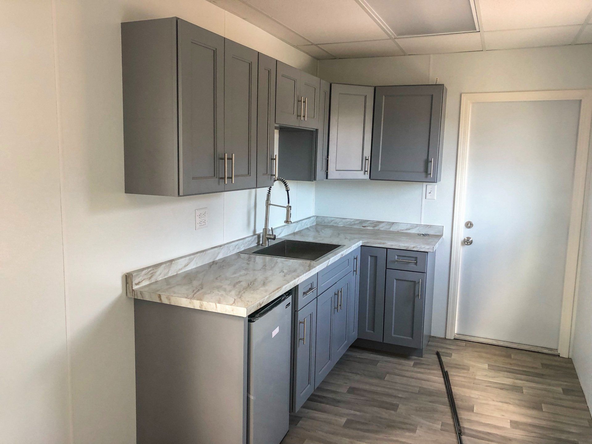 Custom Shipping Container Interior with kitchen and cabinets