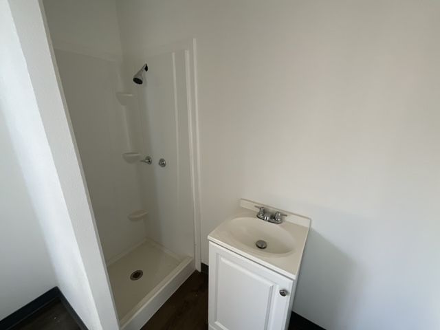 Deluxe shipping container office featuring an interior bathroom