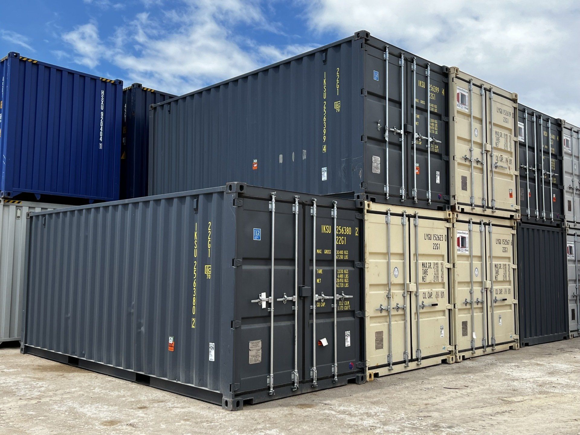 Shipping containers stacked in a holding yard