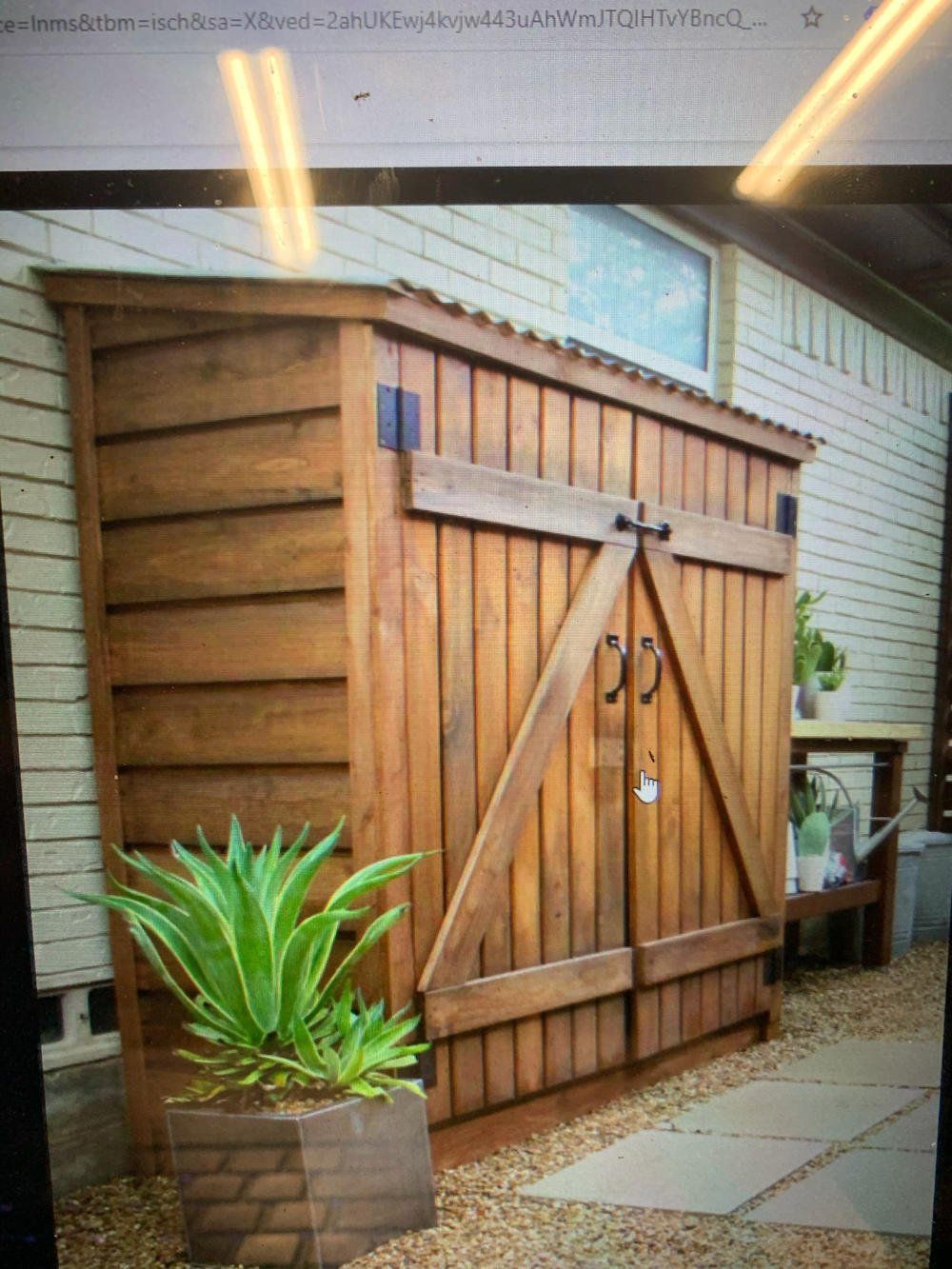 Studio shed with custom exterior wood application